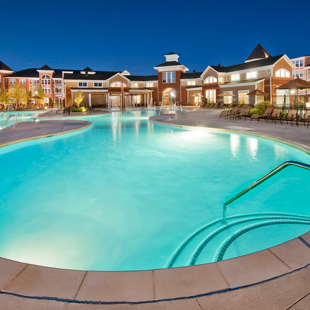 Night time view of swimming pool at Westchester at the Pavilions in